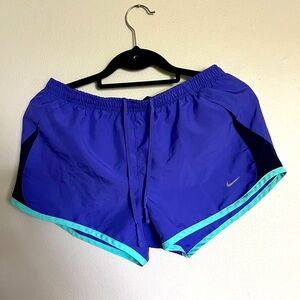 Nike running shorts size M, purple